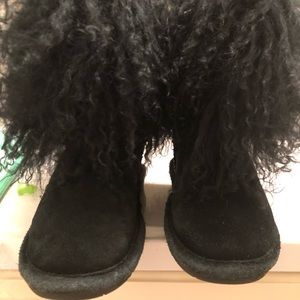 Bearpaw boots some where around the sole area